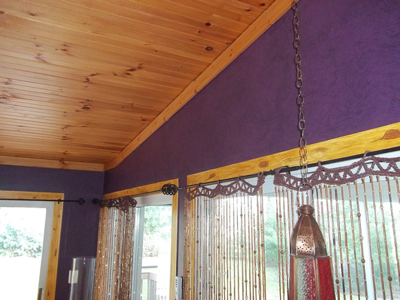 the trim is Faux, and walls have a drk. glaze